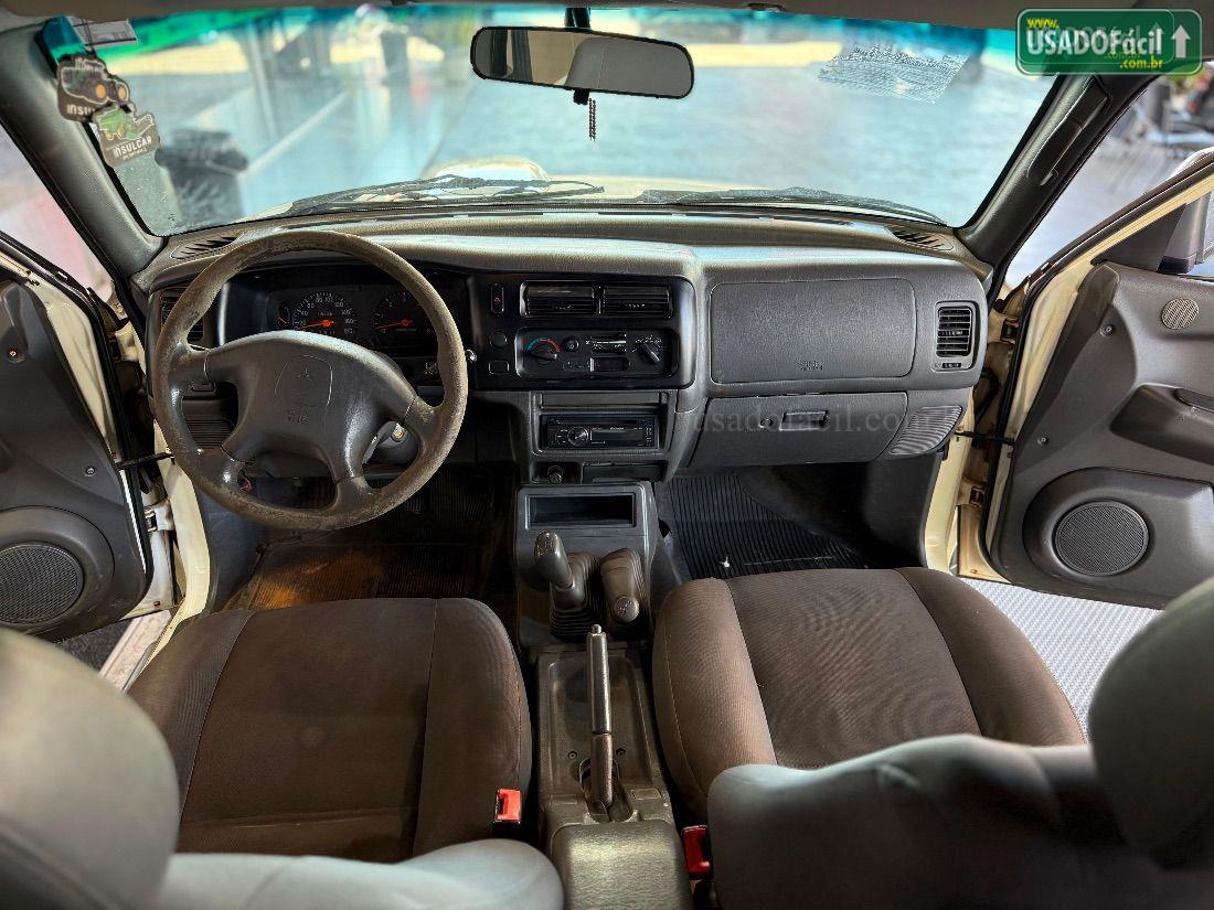 MITSUBISHI L200 Outdoor HPE CD 2.5 4x4 Turbo Mecânico Diesel 2011/2012 — foto 9 de 12