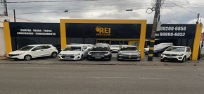Logo Rei Veículos - Cristo Rei